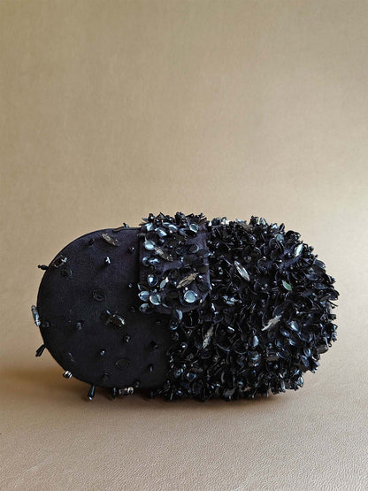 Capsule Clutch